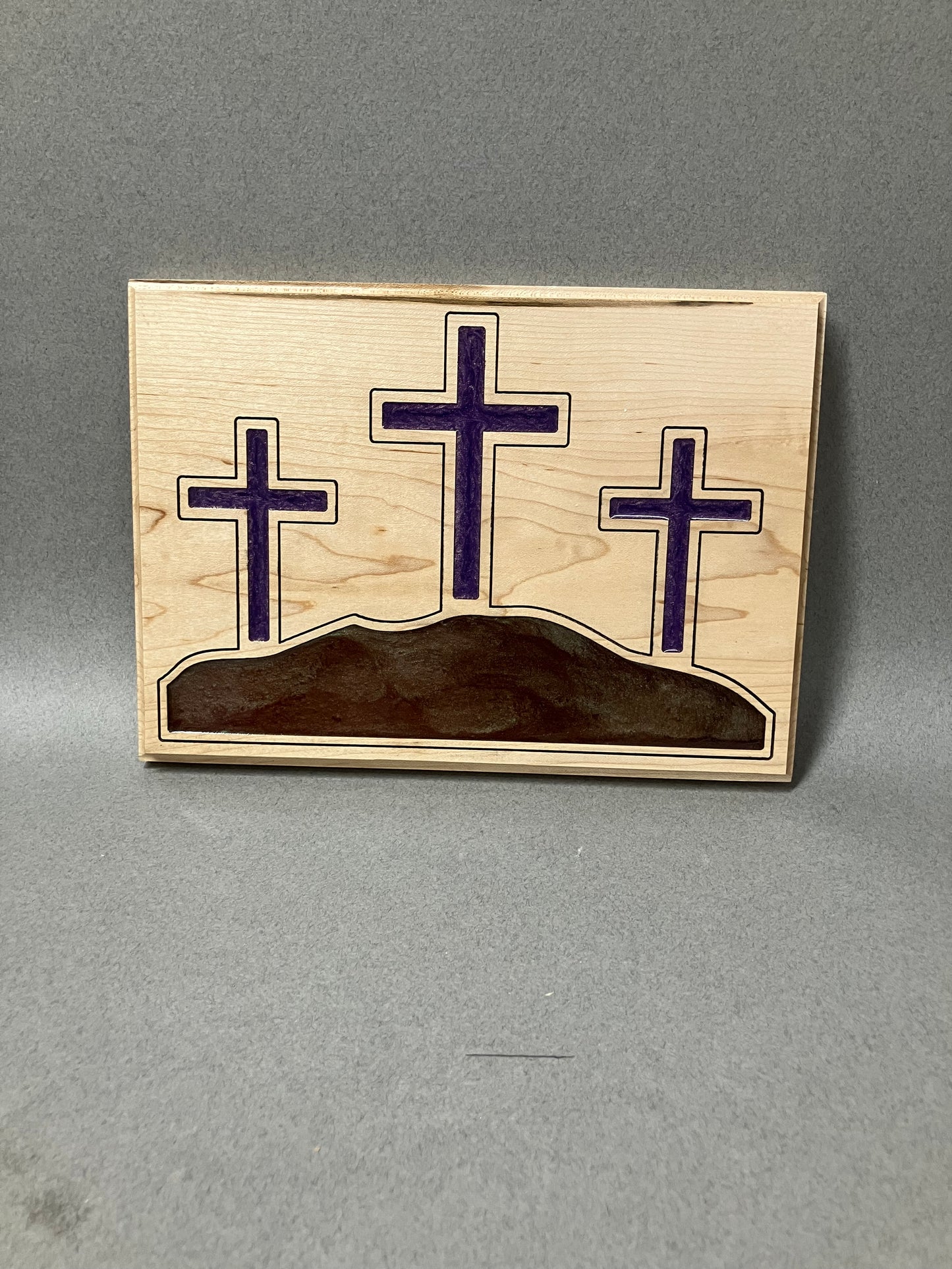 Three crosses in Maple and purple.